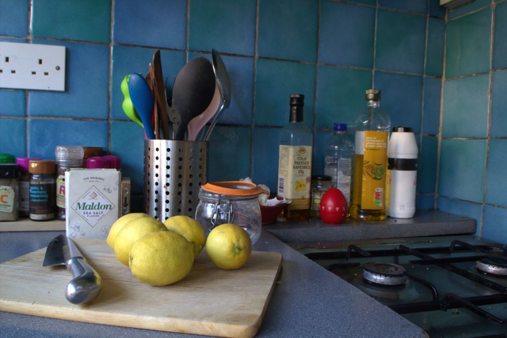 Kitchen and chopping board with lemons